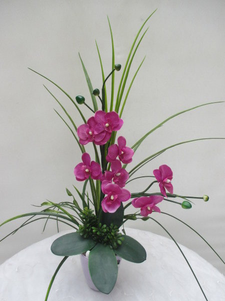 Orchideengesteck pink-lila